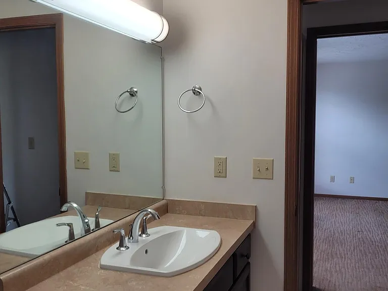 Bathroom looking into master bedroom.