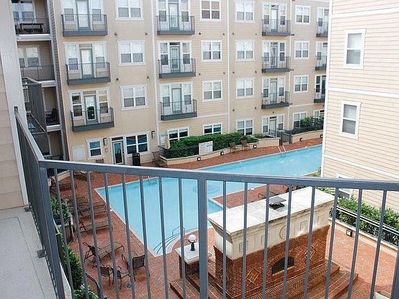 Large balcony overlooking pool