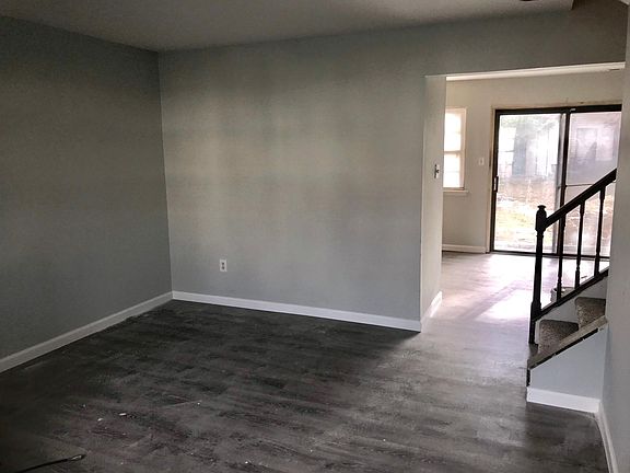 living room, new wood flooring, paint & baseboards
