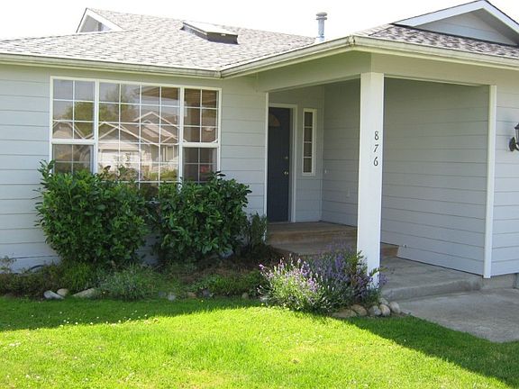 Large back yard with 10x12 deck off the kitchen/family room.