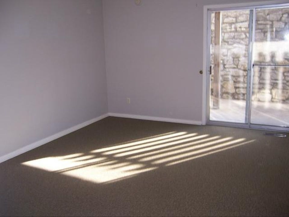 1st bedroom with access to front porch/yard