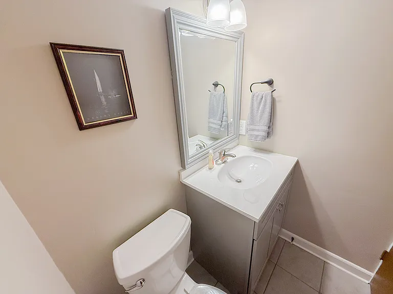 Lower level half bath, cleaning supplies and hand towels included.