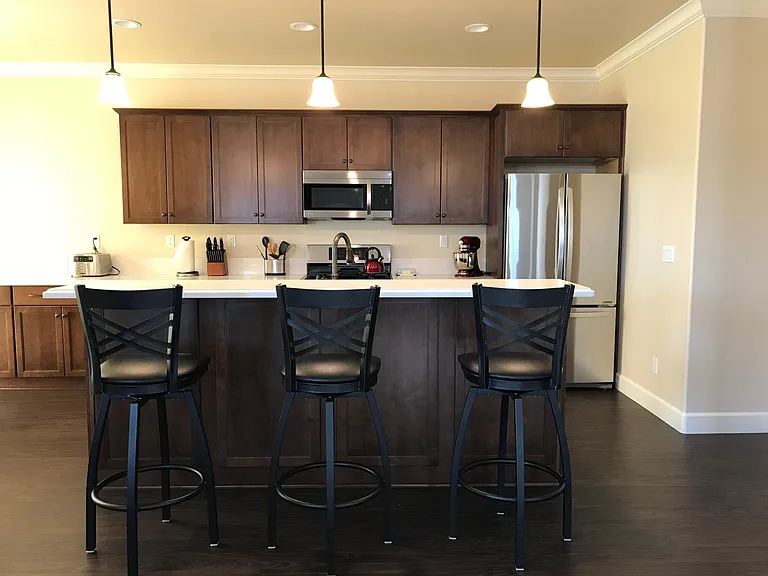 Large center island with raised breakfast bar - perfect for casual dining and entertaining.