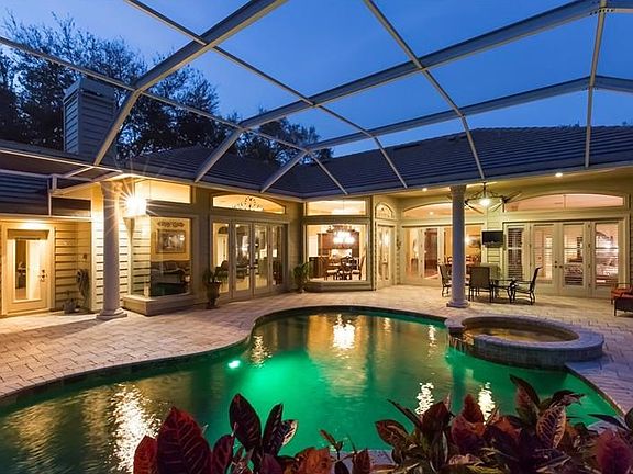 Feel like you live in a resort! This stunning heated pool and spa have eye catching lighting, water 