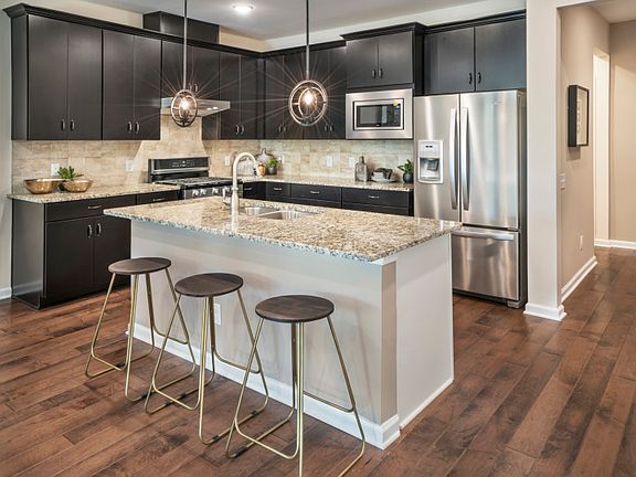 Chef-inspired kitchen with additional seating at the large center island