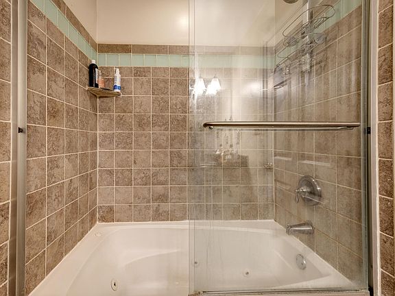 Luxurious full bathroom with Jacuzzi and Shower!