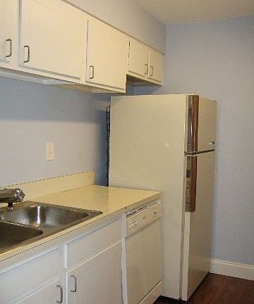 Kitchen with disposal, dishwasher, and refridgerator