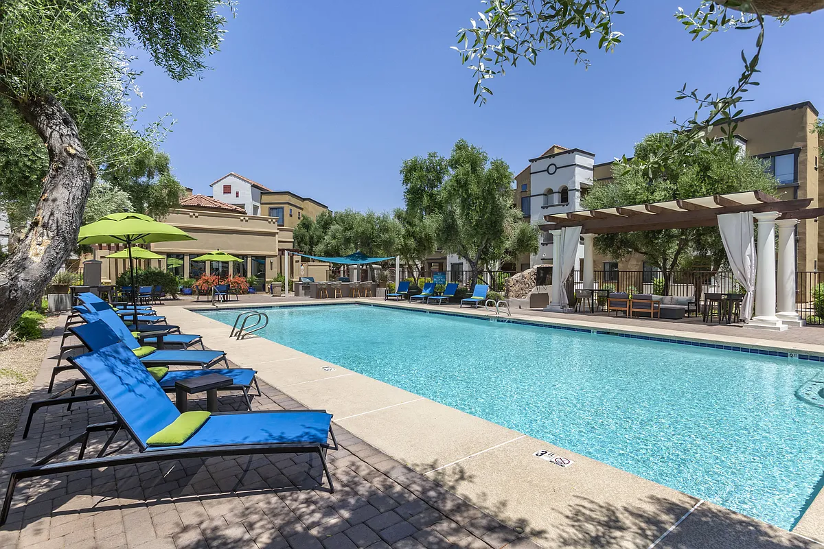 Dive into luxury at our resort-style pool. Take a refreshing dip and soak up the sun in style - Trevi Apartment Homes