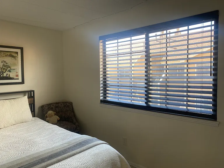 Very bright, south-facing bedroom.