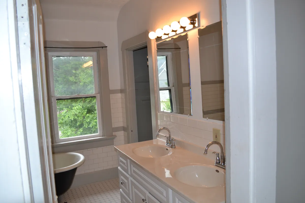 upstairs bath - dual sinks - 1820 N Delaware St