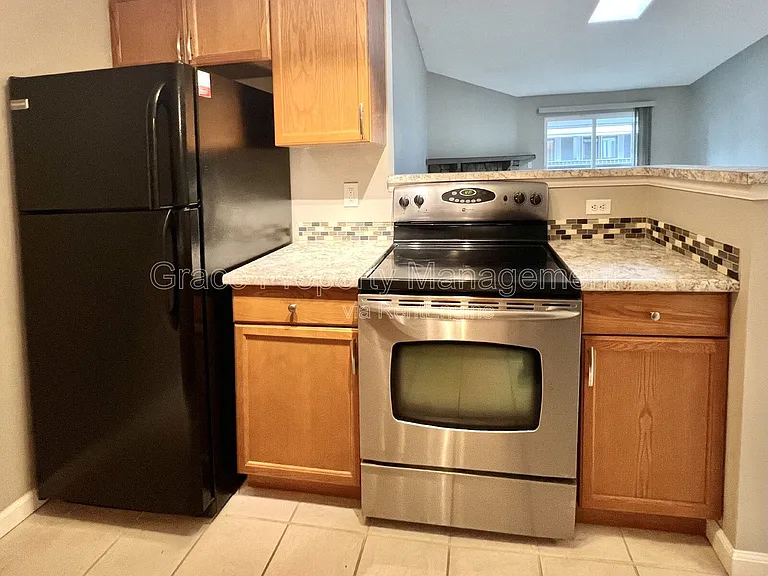 3482 S Eagle St #202 — Photo 6