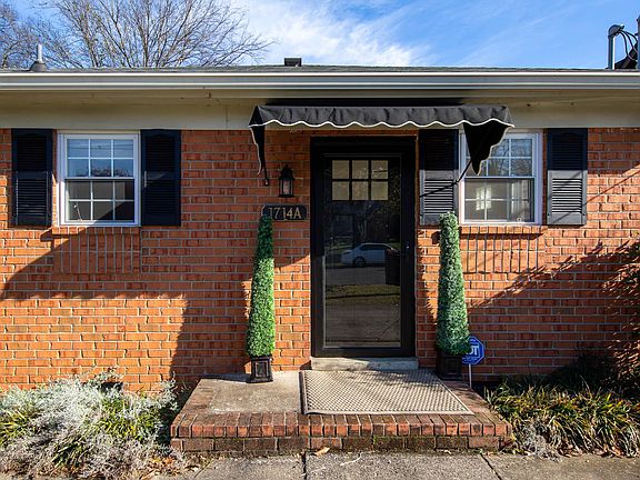 Front entrance - black door with storm door