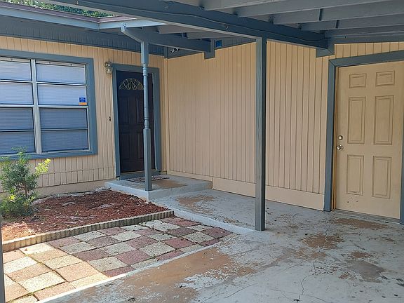 Front entrance and car port