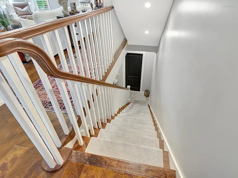 Stair way to first floor/front door