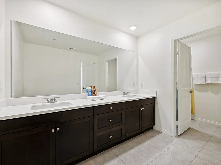 Twice the luxury: enjoy the convenience of dual sinks in your bathroom oasis.