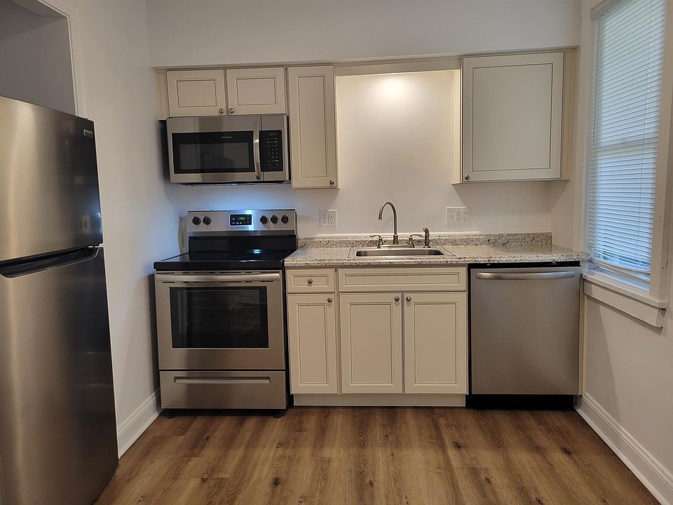 Kitchen on ground level, rear of unit