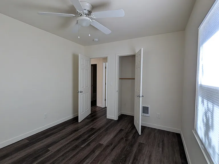 one of three bedrooms