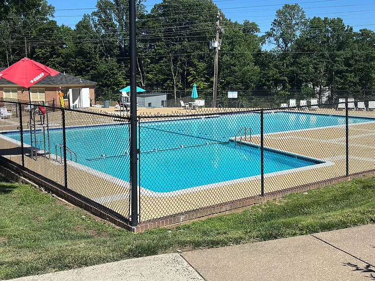 Community Pool Within Short Walking Distance From Rental Unit