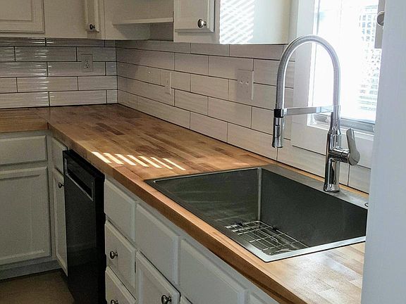 Kitchen - butcher block counter tops and large sink