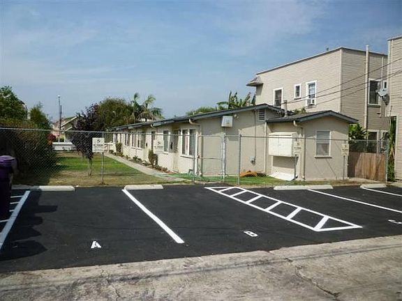 Open parking- 1 space (off alley).