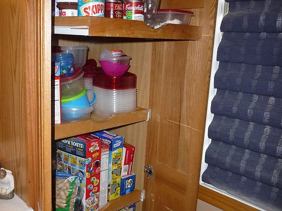 Pantry in kitchen w/sliding shelves
