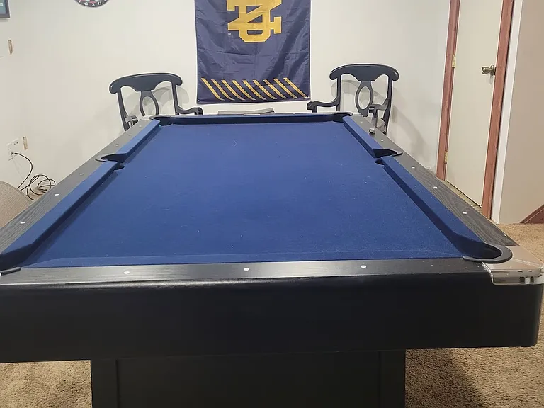 basement pool table for added fun with friends