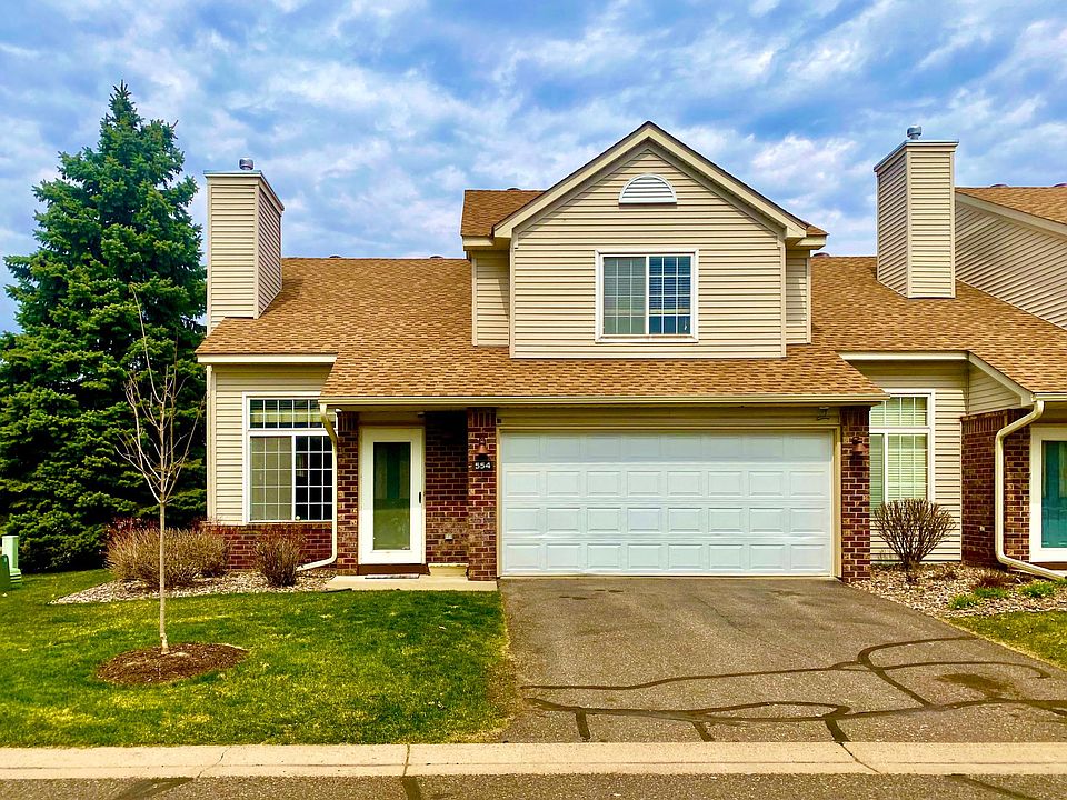 Outside with 2 car garage