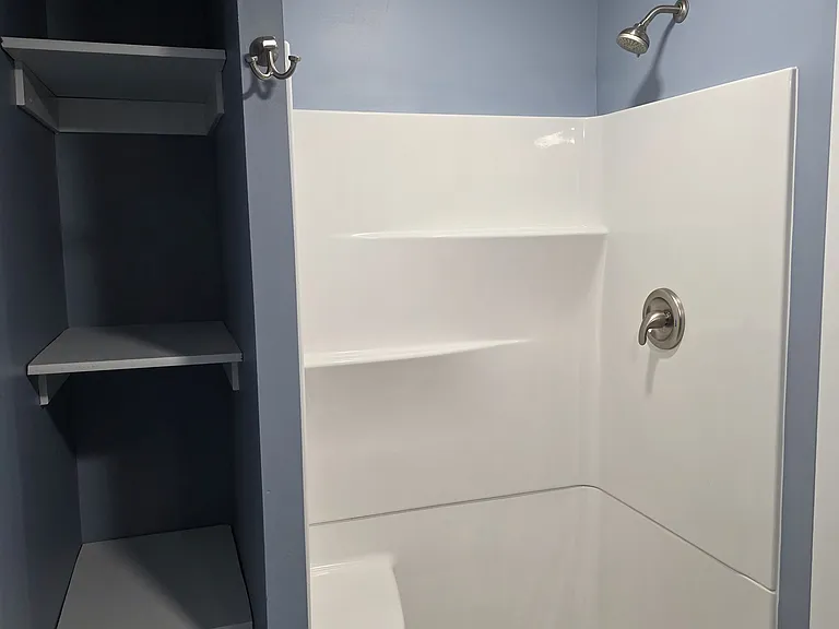Shower and Linen Closet
