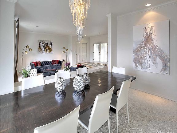 View from the formal dining room toward the formal living room and front entry.