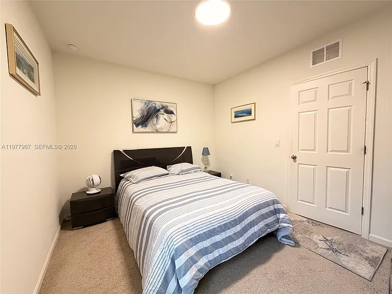 12422 SW Rimini Way — Photo 32