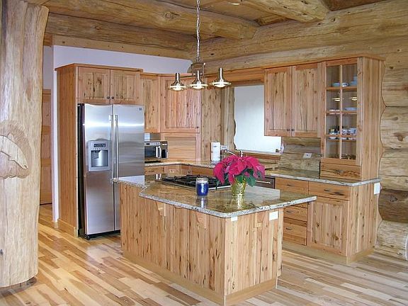 Kitchen with Slab Granite and Reclaimed Hem Fir Cabinets