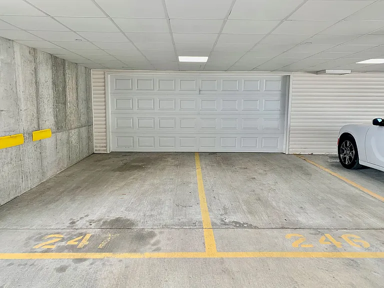 2 Parking Spaces: 1 Garage + 1 Parking Space in Tandem