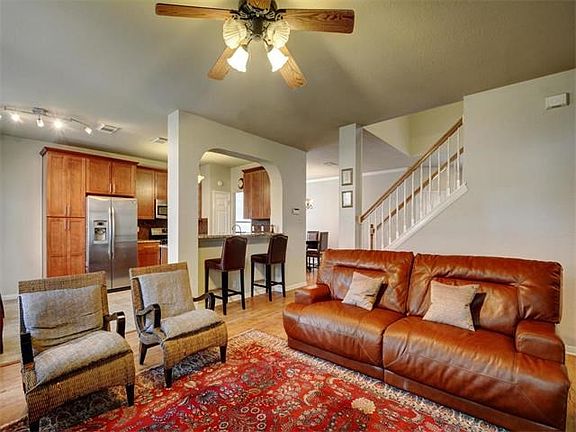 Open floor plan connecting family room and kitchen