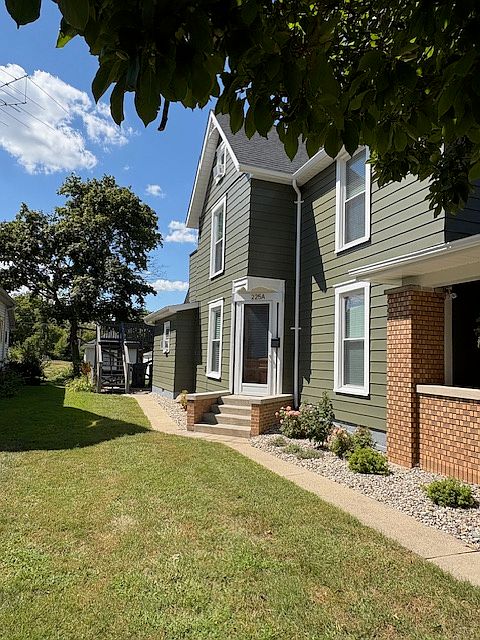 Staircase at end of walk to upstairs apartment