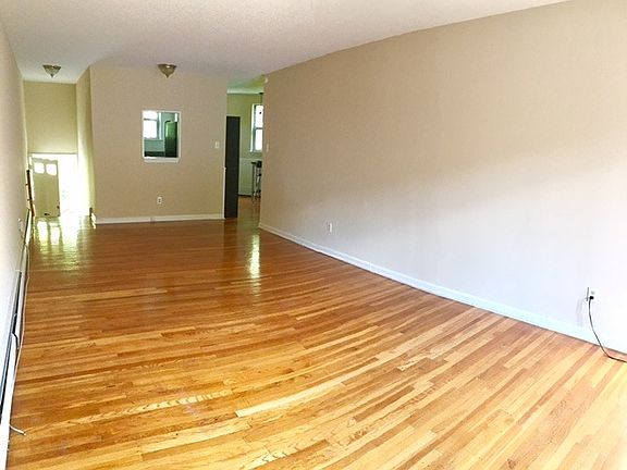 Huge Living Area with Hardwood Floor