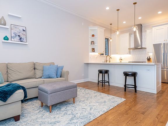 Home opens up to dining or living room space with open kitchen.