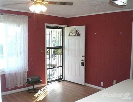15x11 Family room opens to Kitchen.