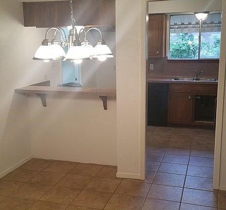 Dining room flows through kitchen