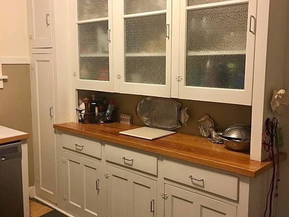 original built in cabinets and new tile floors