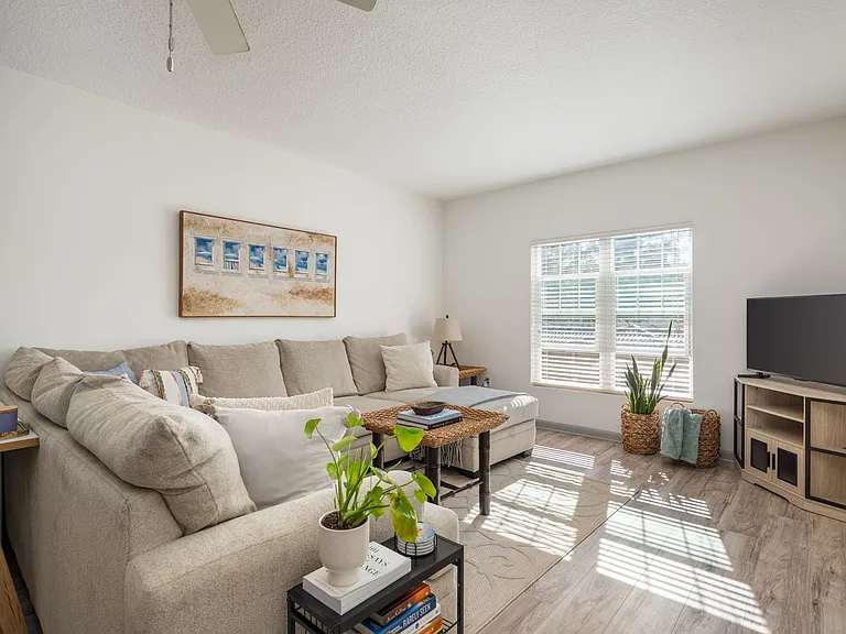Interior with impact rated glass windows. OFFERED UNFURNISHED