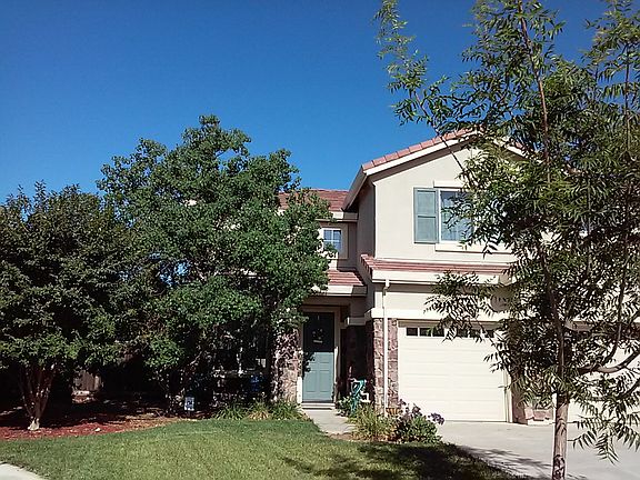 Front yard with shade trees.