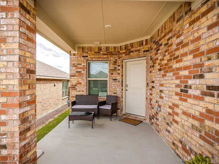 Love this cozy front porch!