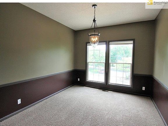 Formal dining room with chair rail detail