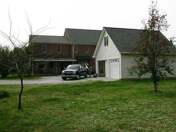 Rear of home  2 car detached garage
