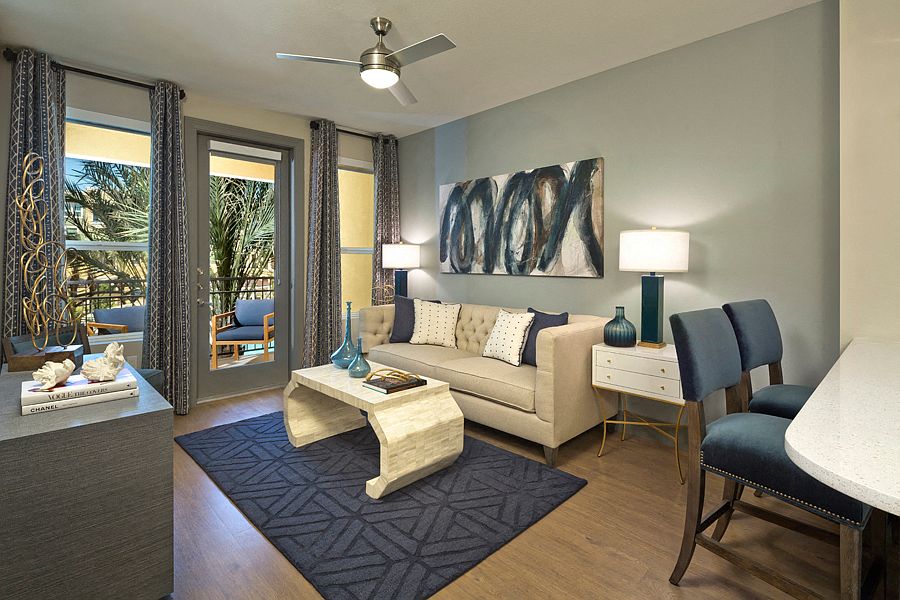 Ceiling fans with lighting in living rooms