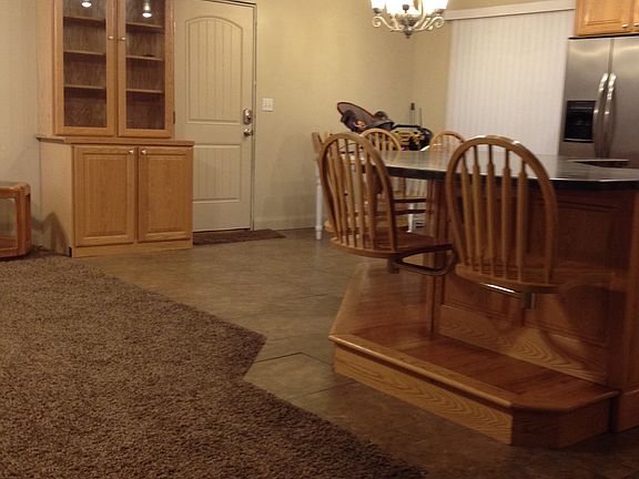 kitchen, dining, and living