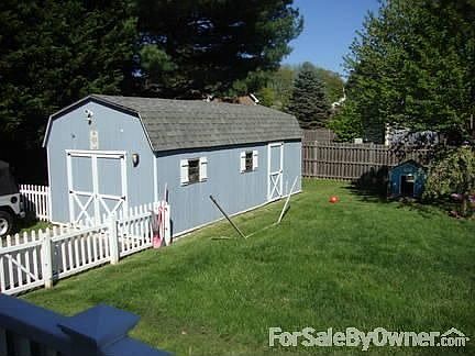 Backyard with large 28' shed/workshop