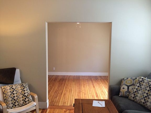 Dining room without furniture in it (as seen from living room)