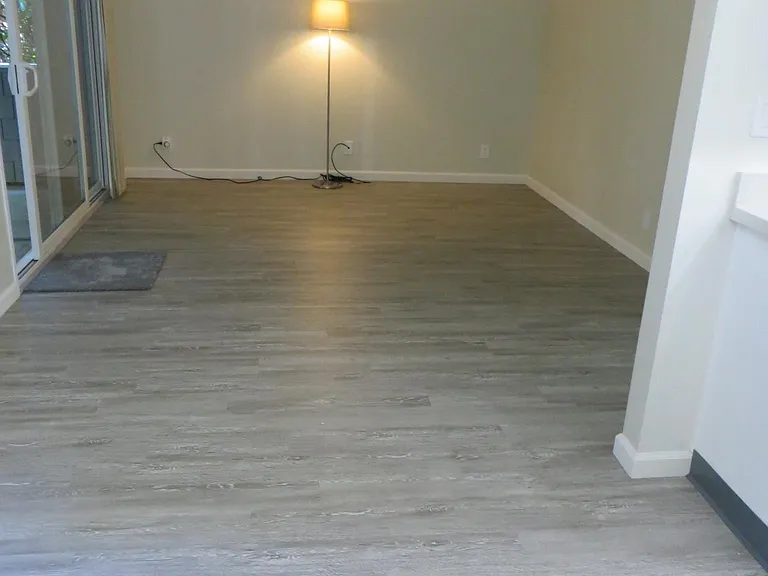 Living/Dining Area to patio area; all new flooring, new base