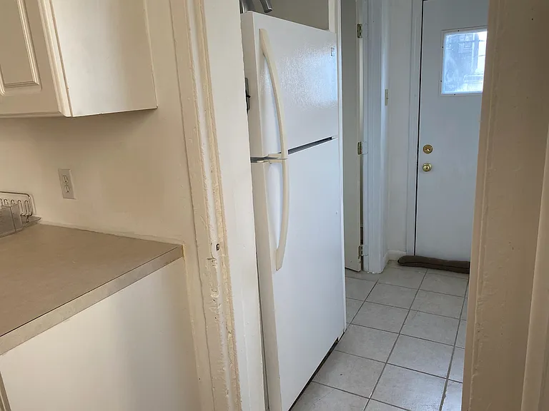 Kitchen to half bath and back door